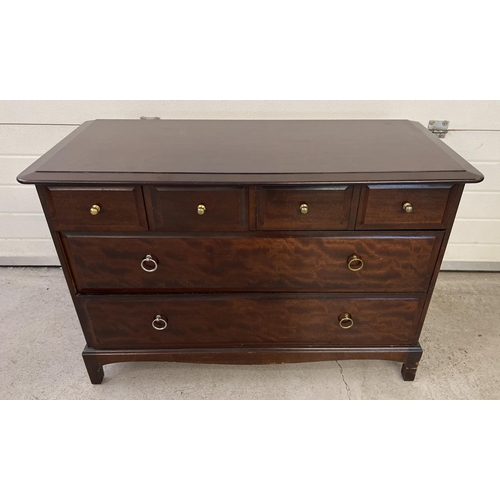 1533 - A solid wood 4 over 2 chest of drawers with shaped base. Both small brass knob handles and drop hand... 