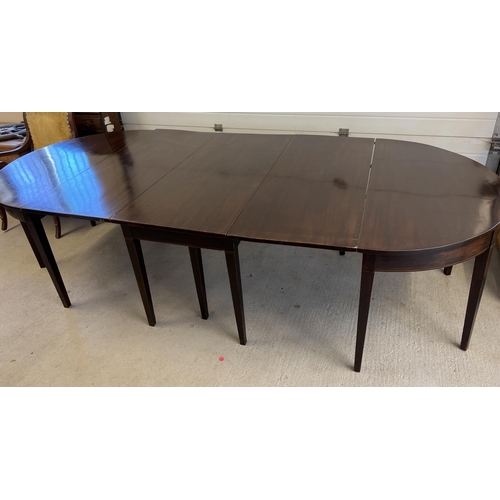 1534 - A 3 piece Georgian mahogany dining table with drop leaf central table and 2 'D' ends. Raised on squa... 