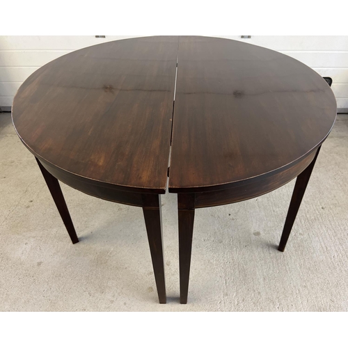 1534 - A 3 piece Georgian mahogany dining table with drop leaf central table and 2 'D' ends. Raised on squa... 