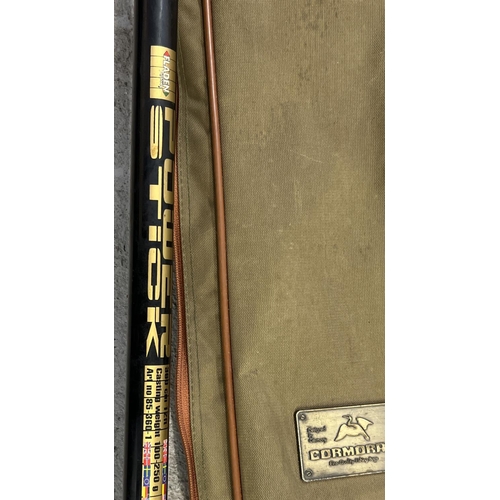 1403 - A Fladen Powerstick 360 12ft fishing rod with canvas bag. Together with a Cormoran fishing rod carry... 