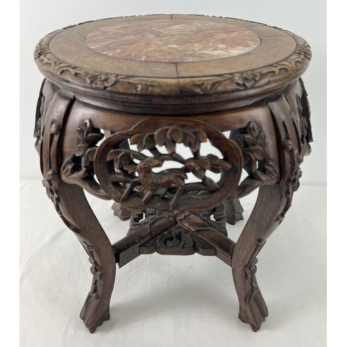 1537 - A Chinese carved hardwood plant stand with marble insert to top. 4 pierced work carved panels with a... 