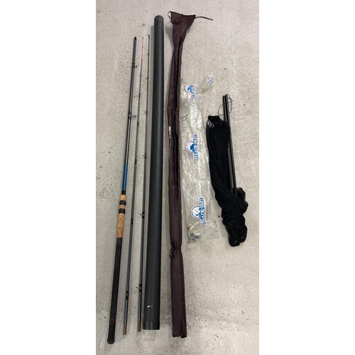 1404 - A Leeda 11ft Twin Top Feeder Leger Series 3000 fishing rod with canvas bag and plastic storage tube.... 