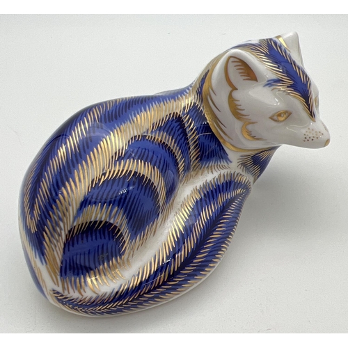 1274 - A Royal Crown Derby arctic fox paperweight in royal blue with hand painted gilt detail. Complete wit... 