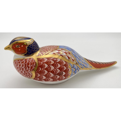 1275 - A Royal Crown Derby pheasant paperweight in Imari colourway with gilt detailing. Complete with gold ... 