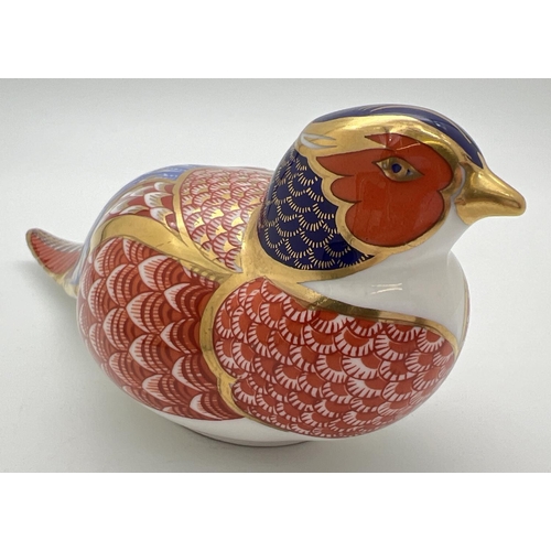 1275 - A Royal Crown Derby pheasant paperweight in Imari colourway with gilt detailing. Complete with gold ... 