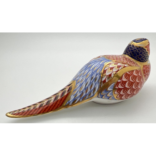 1275 - A Royal Crown Derby pheasant paperweight in Imari colourway with gilt detailing. Complete with gold ... 