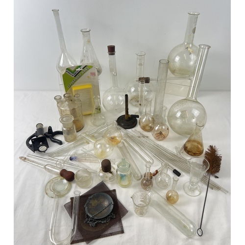 1373 - A collection of vintage laboratory equipment. To include small microscope, Bunsen Burner, glass pipe... 