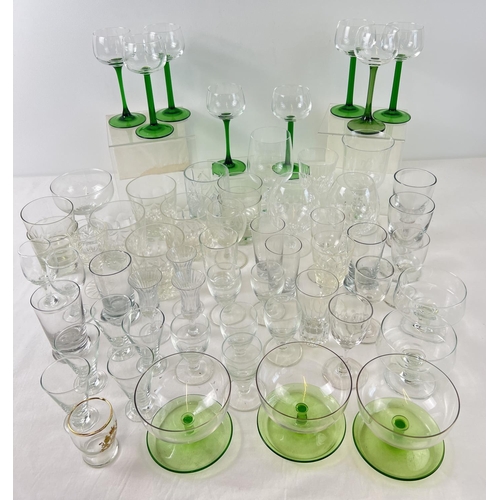 1306 - A box of vintage glasses and sundae dishes in various sizes and design. To include a set of 8 green ... 