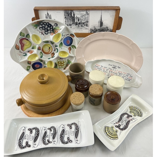 1279 - A box of ceramic kitchen and table ware. To include 2 handled casserole dish, ceramic tile serving t... 