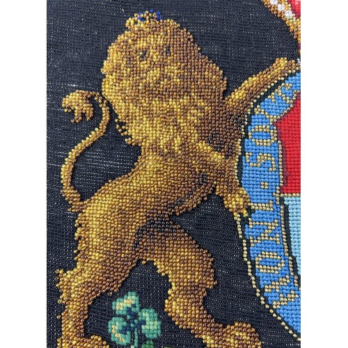 1439 - A vintage heavily beaded piece of needlepoint depicting the Arms of Dominion Royal Coat of Arms. Fab... 