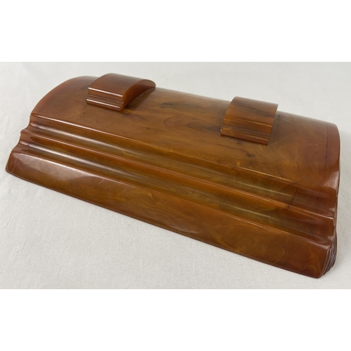 1440 - An Art Deco Carvacraft butterscotch bakelite desk standish with inkwells for black & red ink. Slidin... 