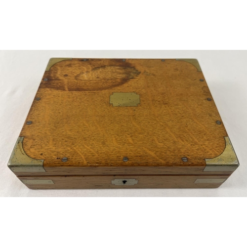 1377 - An antique wooden 2 layer instrument case with brass banding and blue velvet lined interior. Complet... 