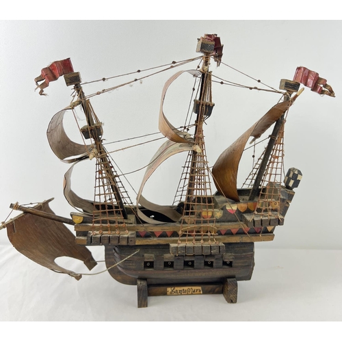 1443 - A wooden hand made model of the Santa Maria Spanish Galleon. Hand painted detail to all sails. Appro... 