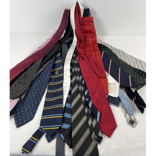 1358 - A quantity of modern & vintage men's ties, on a hanging tie rail. To include examples by Daniel Hech... 