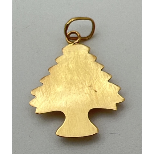 2 - An 18ct gold pendant in the shape of a tree. Gold mark to hanging bale. Approx. 3cm x 2cm (including... 