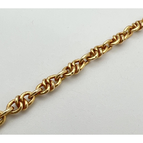 24 - A 9ct gold 8