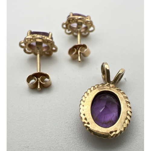 26 - A pair of gold & amethyst set stud earrings together with an oval amethyst set 9ct gold pendant. Hal... 