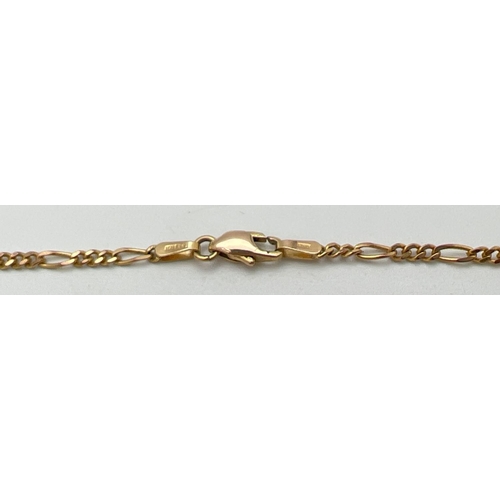 32 - A 22 inch 9ct gold Figaro chain necklace with lobster style clasp. Gold marks to fixings and clasp. ... 