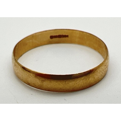 33 - A 9ct gold plain 4mm wide wedding band. Hallmarks to inside of band. Size W. Total weight approx. 1.... 