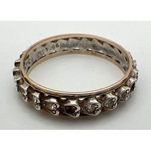 35 - A vintage 9ct gold & silver full eternity ring set with small round cut clear stones. In heart shape... 