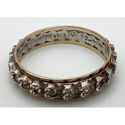 35 - A vintage 9ct gold & silver full eternity ring set with small round cut clear stones. In heart shape... 