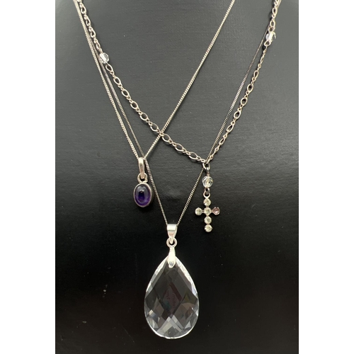 47 - 3 silver and white metal pendant necklaces. A small oval amethyst pendant on a 16