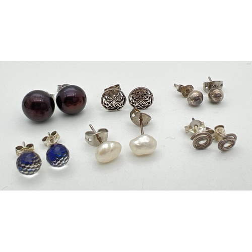 48 - 6 pairs of silver and white metal stud style earrings. To include burgundy pearl studs, white Keshi ... 