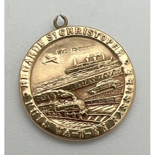 61 - A vintage 9ct gold St. Christopher pendant with train, plane, car and ship detail to back. Fully hal... 