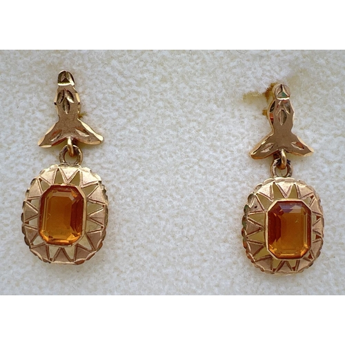 68 - A pair of vintage 18ct gold and citrine lever backed drop earrings. Floral design to posts, square s... 