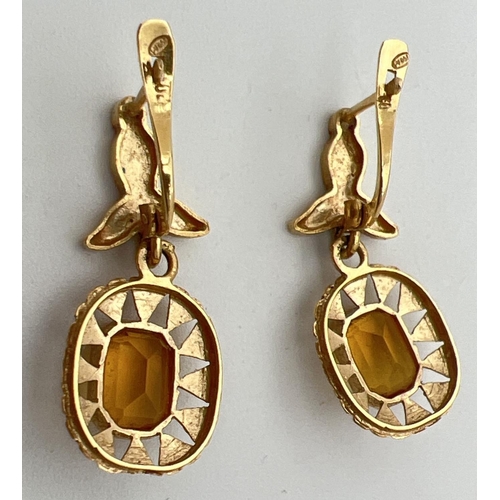 68 - A pair of vintage 18ct gold and citrine lever backed drop earrings. Floral design to posts, square s... 