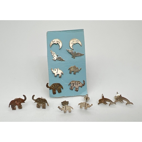 72 - 7 pairs of white metal animal and bird shaped stud style earrings. To include elephants, dolphins an... 