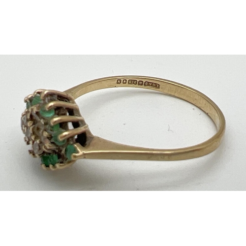 84 - A 9ct gold, emerald and diamond set dress ring. Diamond shaped mount set with small round cut diamon... 