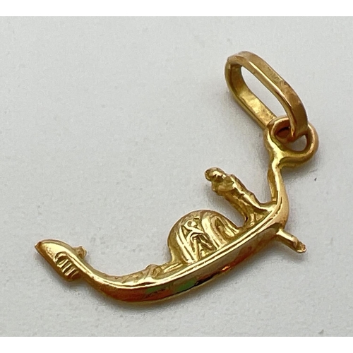 87 - An 18ct gold charm/pendant in the shape of a gondola. Gold marks to bale. Approx. 2.5cm long (includ... 