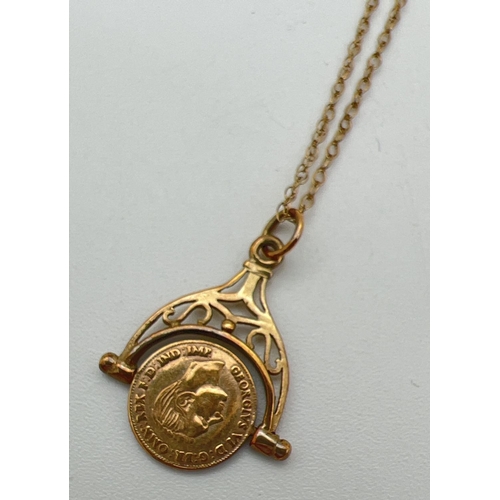 98 - A 9ct gold George VI spinning farthing pendant on a 16