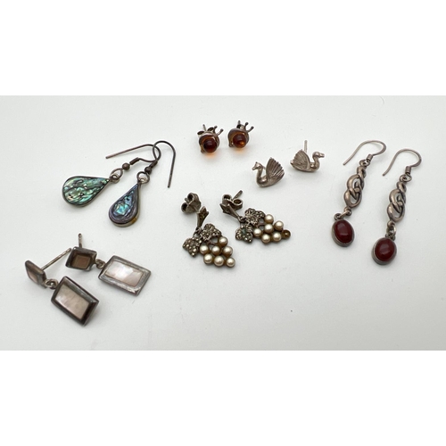 103 - 6 pairs of silver and white metal stud and drop style earrings. To include marcasite and faux pearl ... 