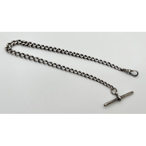 104 - A vintage silver 14 inch Albert watch chain. Worn silver marks to fixing link and lobster clasp. Sil... 