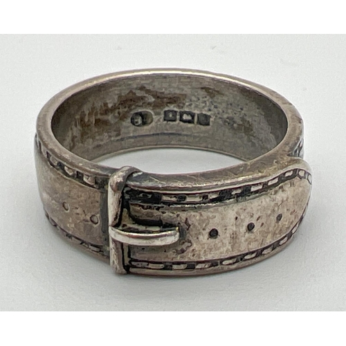 111 - A vintage silver buckle ring. Hallmarks to inside of band for Birmingham 1969. Size N. Total weight ... 