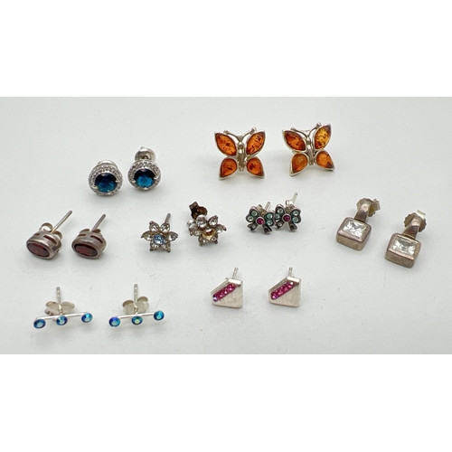 113 - 8 pairs of stone set silver and white metal earrings in both stud and drop styles. For pierced ears,... 