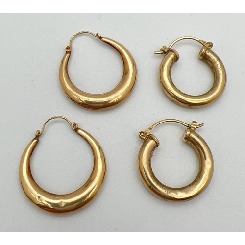 162 - 2 pairs of 9ct gold hoop earrings. A large pair with floral decoration and a plain pair of smaller o... 