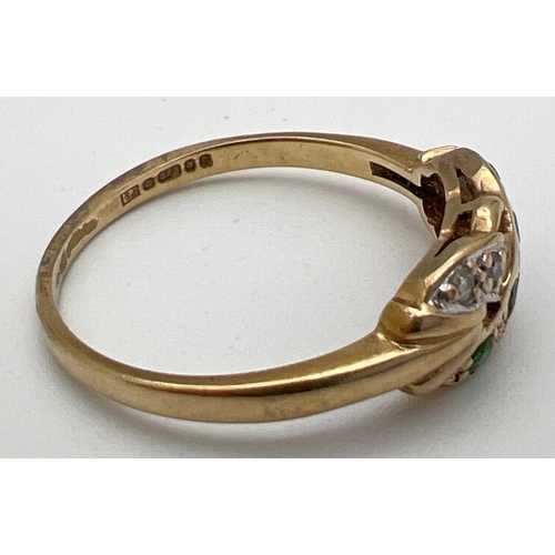 170 - A 9ct gold diamond and emerald set dress ring with crossover style mount. Full hallmarks to inside o... 