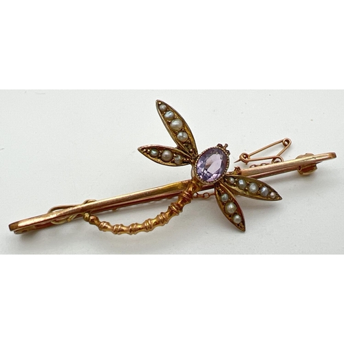 183 - A vintage 9ct gold gem set dragonfly bar brooch with safety chain. Oval cut amethyst set to body wit... 