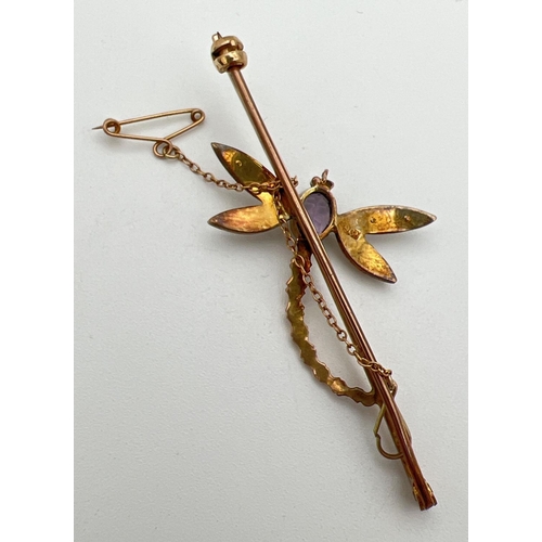 183 - A vintage 9ct gold gem set dragonfly bar brooch with safety chain. Oval cut amethyst set to body wit... 