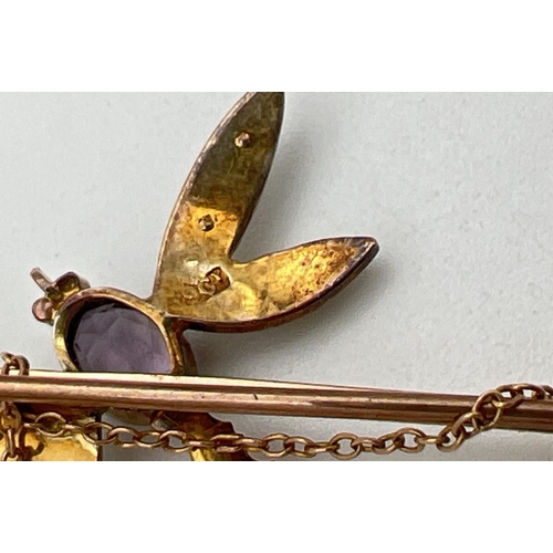 183 - A vintage 9ct gold gem set dragonfly bar brooch with safety chain. Oval cut amethyst set to body wit... 