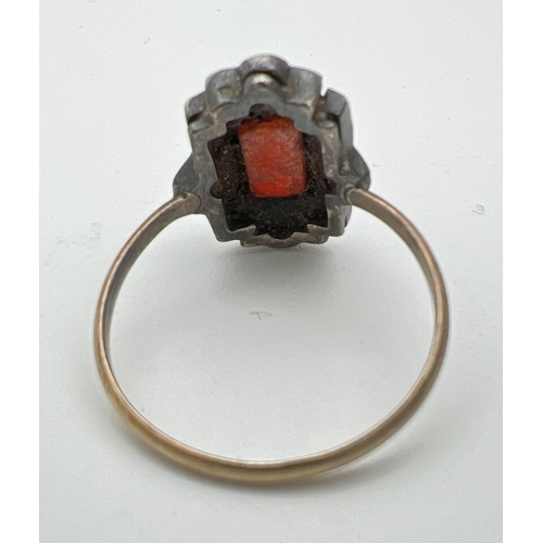 188 - A vintage Art Deco design 9ct gold dress ring set with a rectangular cut carnelian stone surrounded ... 