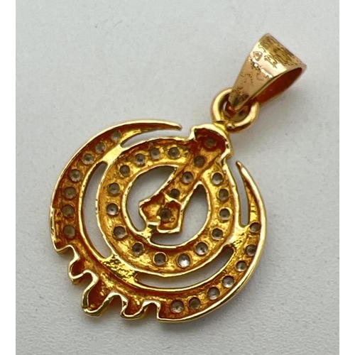 194 - A 14ct gold Khanda pendant set with 0.34ct of small round cut diamonds. Gold and diamond marks to ba... 