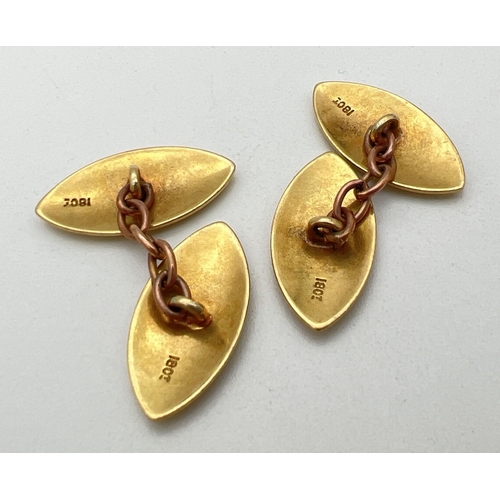 196 - A pair of 18ct gold marquise shaped cufflinks with engraved initials J I G to each. Marked 18ct to b... 