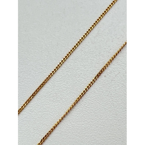 197 - An 18ct gold 18 inch fine curb chain with spring ring clasp. Total weight approx. 0.6g.