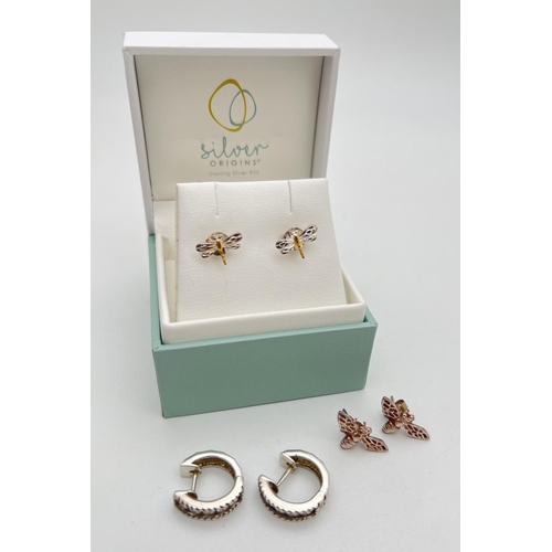 202 - 3 pairs of silver and white metal earrings. A boxed pair of dragonfly studs, a pair of bumble bee st... 