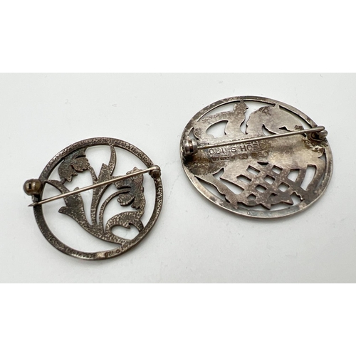 207 - 2 silver circular shaped pierced work brooches. A Shetland brooch depicting Odin's Horse and brooch ... 