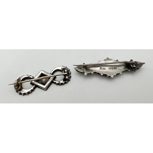 216 - 2 Victorian silver brooches of floral design, one with small empty cartouche (pin clasp missing). Ha... 